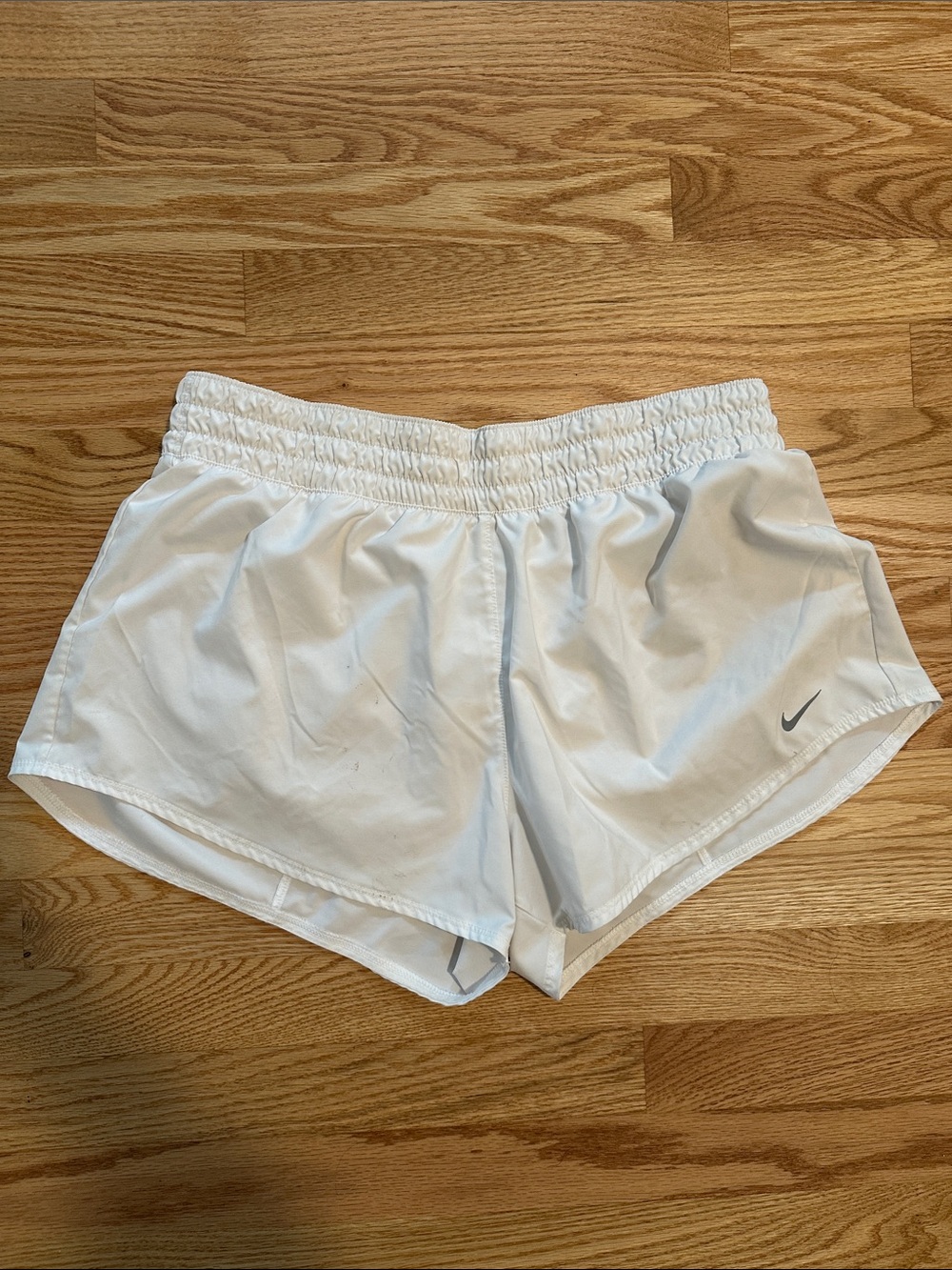 Nike Women's White Athletic Running Shorts with Small Swoosh